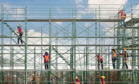 construction workers on scaffolding