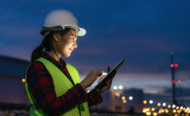 construction woman with tablet